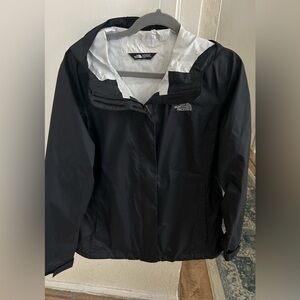 Woman’s north face black rain coat XL